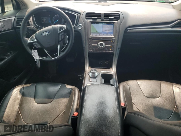 2019 Ford Fusion Titanium with VIN 3FA6P0K91KR217096, listed as a Copart auction lot 57796185 with 84,128 mi miles and Salvage title. Bid and sale history available at DreamBid. Image 8.