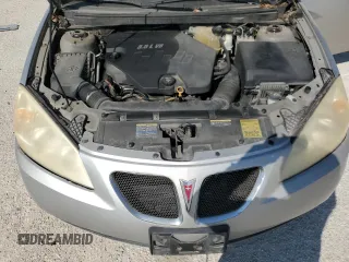 2008 Pontiac G6 z VIN 1G2ZG57N184198212, wystawiony jako Copart lot #70977674 z przebiegiem 118 154 mil mil oraz Czysty tytuł • Clean title. Historia ofert i sprzedaży dostępna na DreamBid. Obrazek 11.