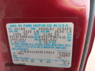 1989 Ford Aerostar with VIN 1FMCA11U2KZC19215, listed as a IAAI auction lot 41719140 with 3,566 mi miles. Bid and sale history available at carsss.com. Image 9.