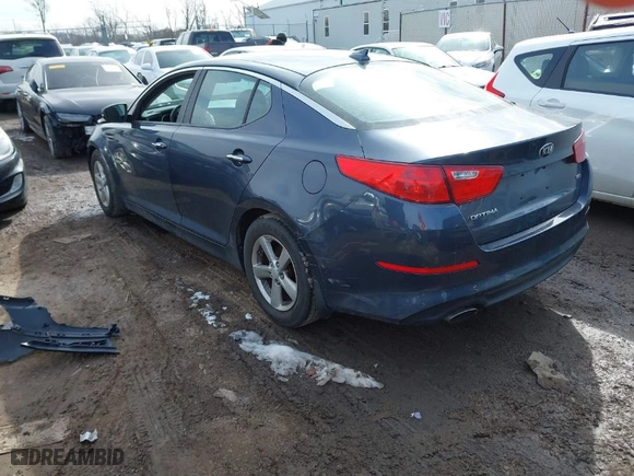 2015 Kia Optima LX with VIN KNAGM4A74F5601538, listed as a IAAI auction lot 41650956 with 137,916 mi miles. Bid and sale history available at carsss.com. Image 3.