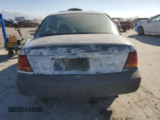1998 Saturn SL with VIN 1G8ZF5287WZ120978, listed as a Copart auction lot 43070995 with 279,889 mi miles and Salvage Title. Bid and sale history available at carsss.com. Image 6.