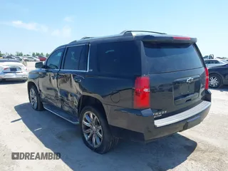 2015 Chevrolet Tahoe LTZ with VIN 1GNSCCKC4FR309152, listed as a IAAI auction lot 42029341 with 187,313 mi miles and . Bid and sale history available at DreamBid. Image 3.