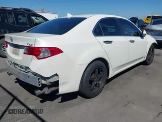 2009 Acura TSX with VIN JH4CU266X9C025233, listed as a IAAI auction lot 41871889 with 198,408 mi miles. Bid and sale history available at carsss.com. Image 4.