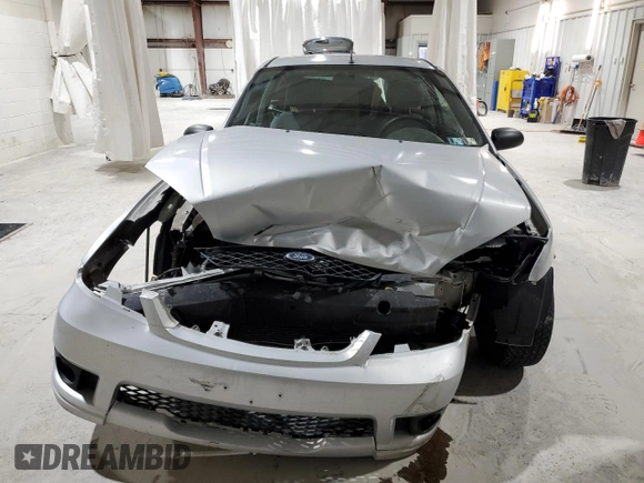 2007 Ford Focus S with VIN 1FAHP31N57W113952, listed as a Copart auction lot 51070245 with 149,809 mi miles and Salvage Title. Bid and sale history available at DreamBid. Image 5.