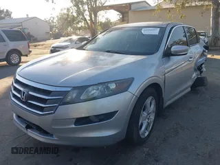 2010 Honda Crosstour EX-L z VIN 5J6TF1H59AL004799, wystawiony jako IAAI lot #41668347 z przebiegiem 214 195 mil mil oraz . Historia ofert i sprzedaży dostępna na DreamBid. Obrazek 2.