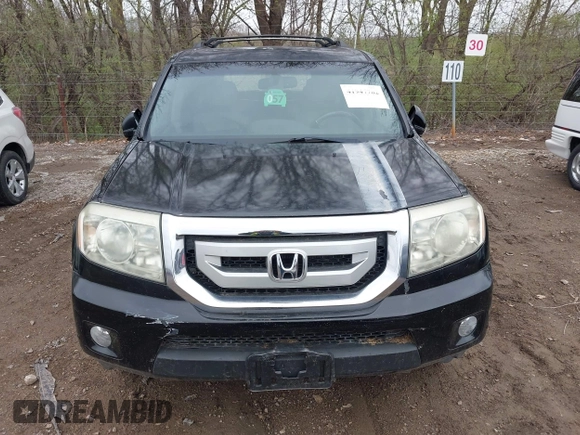 2009 Honda Pilot Touring with VIN 5FNYF48959B016978, listed as a IAAI auction lot 41947782 with 234,115 mi miles and . Bid and sale history available at carsss.com. Image 12.