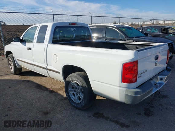 2005 Dodge Dakota SLT with VIN 1D7HE42KX5S251037, listed as a IAAI auction lot 41334761 with 202,865 mi miles and . Bid and sale history available at carsss.com. Image 3.