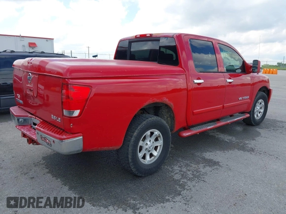 2005 Nissan Titan SE with VIN 1N6BA07B35N500027, listed as a IAAI auction lot 42150226 with 200,877 mi miles. Bid and sale history available at carsss.com. Image 4.