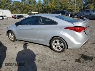 2013 Hyundai Elantra Coupe GS PZEV with VIN KMHDH6AE0DU022405, listed as a Copart auction lot 76497474 with 64,249 mi miles and Salvage Title. Bid and sale history available at carsss.com. Image 2.