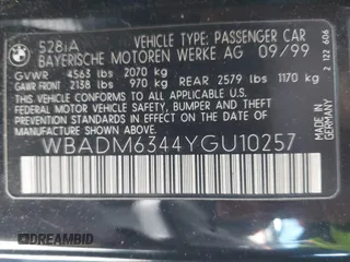 2000 BMW 5 Series 528iA with VIN WBADM6344YGU10257, listed as a IAAI auction lot 41773733 with 231,028 mi miles. Bid and sale history available at carsss.com. Image 9.
