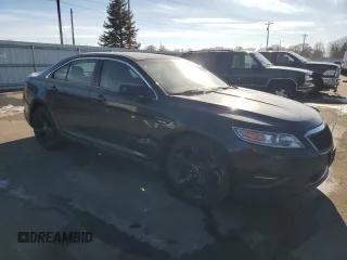 2010 Ford Taurus SHO with VIN 1FAHP2KT6AG153644, listed as a Copart auction lot 42952425 with 124,928 mi miles and Salvage title. Bid and sale history available at DreamBid. Image 4.