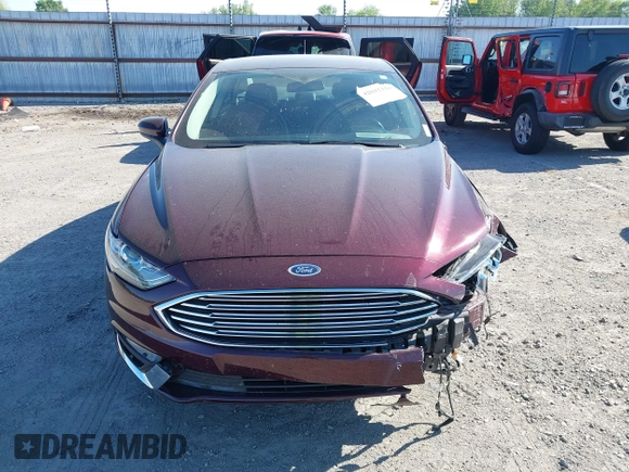 2017 Ford Fusion SE z VIN 3FA6P0H70HR198507, wystawiony jako IAAI lot #42033338 z przebiegiem 94 363 mil mil oraz . Historia ofert i sprzedaży dostępna na DreamBid. Obrazek 12.