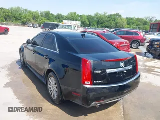 2012 Cadillac CTS Sedan Luxury with VIN 1G6DG5E58C0115323, listed as a IAAI auction lot 42002818 with 107,226 mi miles. Bid and sale history available at carsss.com. Image 3.
