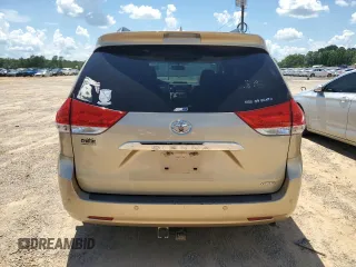 2014 Toyota Sienna XLE with VIN 5TDYK3DC8ES414814, listed as a Copart auction lot 64577875 with 111,675 mi miles and Salvage title. Bid and sale history available at DreamBid. Image 6.