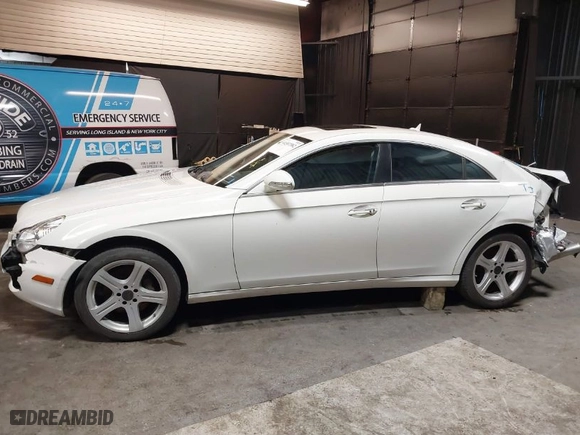 2007 Mercedes-Benz CLS-Class 5.5L with VIN WDDDJ72X77A100625, listed as a IAAI auction lot 41587582 with 115,501 mi miles. Bid and sale history available at carsss.com. Image 14.