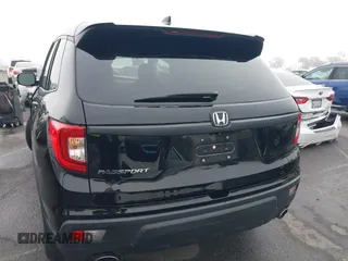 2021 Honda Passport EX-L with VIN 5FNYF7H5XMB013923, listed as a IAAI auction lot 41669295 with 42,969 mi miles. Bid and sale history available at carsss.com. Image 15.