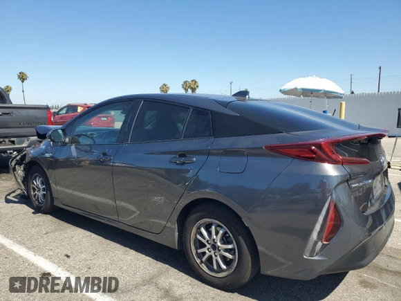2021 Toyota Prius LE with VIN JTDKAMFP5M3177018, listed as a Copart auction lot 63930405 with 58,439 mi miles and Salvage title. Bid and sale history available at DreamBid. Image 2.