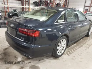2016 Audi A6 2.0T Premium Plus with VIN WAUGFAFC4GN052293, listed as a IAAI auction lot 41683195 with 85,312 mi miles. Bid and sale history available at carsss.com. Image 4.
