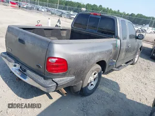 2003 Ford F-150 XL with VIN 2FTRX07W93CB11978, listed as a IAAI auction lot 42549547 with 209,486 mi miles and . Bid and sale history available at DreamBid. Image 4.