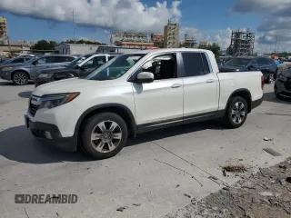 2017 Honda Ridgeline RTL with VIN 5FPYK2F53HB001434, listed as a Copart auction lot 58414335 with 187,711 mi miles and Salvage title. Bid and sale history available at DreamBid. Image 1.