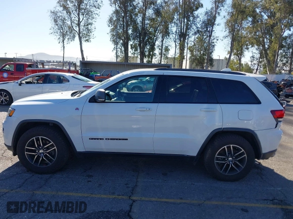 2017 Jeep Grand Cherokee Trailhawk with VIN 1C4RJFLGXHC959092, listed as a IAAI auction lot 41232281 with 108,659 mi miles and . Bid and sale history available at DreamBid. Image 14.