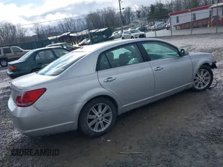 2010 Toyota Avalon XL with VIN 4T1BK3DB4AU357378, listed as a IAAI auction lot 38318161 with 74,523 mi miles and . Bid and sale history available at carsss.com. Image 4.