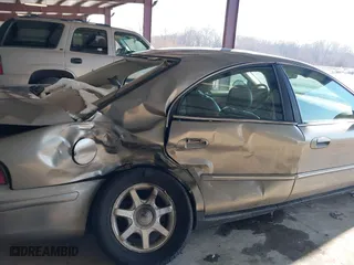2003 Mercury Sable LS Premium with VIN 1MEFM55S43A631966, listed as a IAAI auction lot 41408623 with 130,010 mi miles. Bid and sale history available at carsss.com. Image 6.