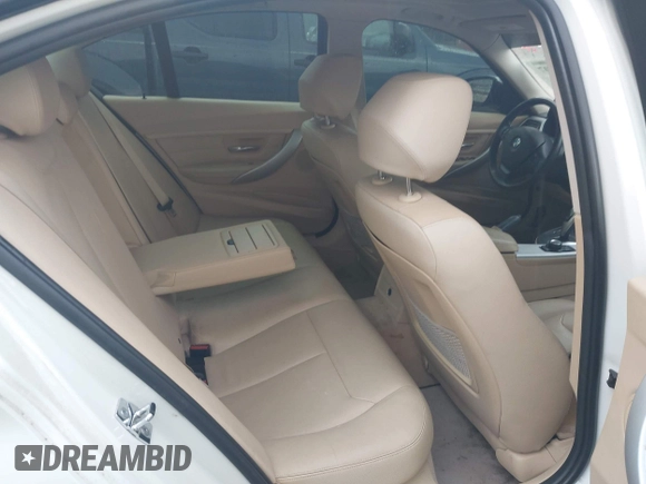 2012 BMW 3 Series 328i with VIN WBA3A5G57CNP16102, listed as a IAAI auction lot 42088407 with 70,608 mi miles and . Bid and sale history available at carsss.com. Image 8.