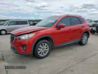 2016 Mazda CX-5 Touring z VIN JM3KE2CY2G0658265, wystawiony jako Copart lot #56194515 z przebiegiem 149 058 mil mil oraz Szkody całkowita. Historia ofert i sprzedaży dostępna na DreamBid. Obrazek 1.