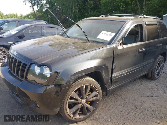 2005 Jeep Grand Cherokee Laredo z VIN 1J4GR48K65C725099, wystawiony jako IAAI lot #42509223 z przebiegiem 249 216 mil mil oraz . Historia ofert i sprzedaży dostępna na DreamBid. Obrazek 2.