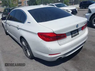 2018 BMW 5 Series 530e with VIN WBAJA9C58JB252868, listed as a IAAI auction lot 42323949 with 100,530 mi miles and . Bid and sale history available at DreamBid. Image 3.