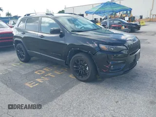2023 Jeep Cherokee Altitude Lux z VIN 1C4PJMMB4PD112477, wystawiony jako IAAI lot #42501542 z przebiegiem 60 883 mil mil oraz . Historia ofert i sprzedaży dostępna na DreamBid. Obrazek 1.