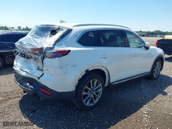 2016 Mazda CX-9 Grand Touring with VIN JM3TCBDY7G0125708, listed as a IAAI auction lot 39891843 with 133,988 mi miles. Bid and sale history available at carsss.com. Image 4.
