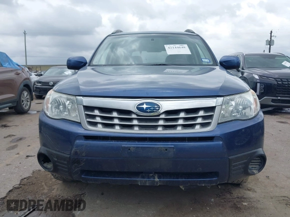 2012 Subaru Forester X Premium z VIN JF2SHBCC7CH431025, wystawiony jako IAAI lot #42144648 z przebiegiem 114 336 mil mil oraz . Historia ofert i sprzedaży dostępna na DreamBid. Obrazek 6.