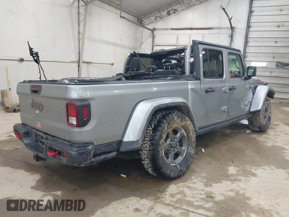 2020 Jeep Gladiator Rubicon with VIN 1C6JJTBGXLL136627, listed as a IAAI auction lot 42333468 with 74,717 mi miles and . Bid and sale history available at DreamBid. Image 4.