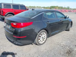 2015 Kia Optima LX with VIN KNAGM4A71F5630673, listed as a IAAI auction lot 42106584 with 245,005 mi miles. Bid and sale history available at carsss.com. Image 4.