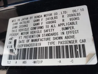 2010 Acura TSX with VIN JH4CU2F69AC031819, listed as a IAAI auction lot 42080516 with 233,042 mi miles. Bid and sale history available at carsss.com. Image 9.