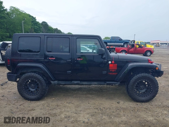 2008 Jeep Wrangler Unlimited Sahara with VIN 1J4GA59128L504798, listed as a IAAI auction lot 42210839 with 162,406 mi miles and . Bid and sale history available at DreamBid. Image 14.