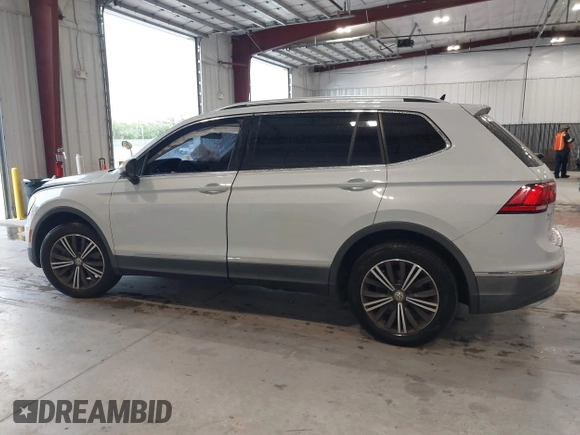 2019 Volkswagen Tiguan SE with VIN 3VV3B7AX9KM030028, listed as a IAAI auction lot 40445099 with 85,400 mi miles and . Bid and sale history available at DreamBid. Image 14.