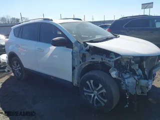 2017 Toyota RAV4 LE with VIN JTMZFREV8HJ111318, listed as a IAAI auction lot 41649660 with 117,018 mi miles. Bid and sale history available at carsss.com. Image 13.