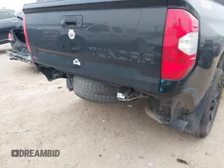2019 Toyota Tundra SR with VIN 5TFRM5F1XKX143105, listed as a IAAI auction lot 41274567 with 180,602 mi miles and . Bid and sale history available at DreamBid. Image 6.