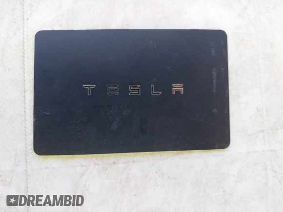 2018 Tesla Model 3 Long Range Battery z VIN 5YJ3E1EA6JF041970, wystawiony jako IAAI lot #42224514 z przebiegiem 79 744 mil mil oraz . Historia ofert i sprzedaży dostępna na DreamBid. Obrazek 11.
