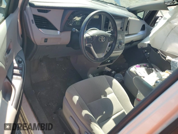 2017 Toyota Sienna L with VIN 5TDZZ3DC4HS779589, listed as a Copart auction lot 48860415 with 128,566 mi miles and Salvage Title. Bid and sale history available at DreamBid. Image 8.