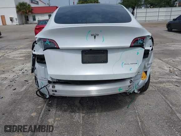 2023 Tesla Model Y Long Range z VIN 7SAYGDEE0PA065534, wystawiony jako IAAI lot #42445868 z przebiegiem 22 638 mil mil oraz . Historia ofert i sprzedaży dostępna na DreamBid. Obrazek 20.