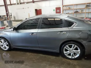 2014 Nissan Altima SL with VIN 1N4BL3AP0EC199270, listed as a IAAI auction lot 42069952 with 94,402 mi miles and . Bid and sale history available at DreamBid. Image 14.