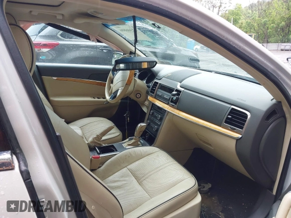 2012 Lincoln MKZ with VIN 3LNHL2JC0CR814339, listed as a IAAI auction lot 42346806 with 127,943 mi miles and . Bid and sale history available at DreamBid. Image 5.