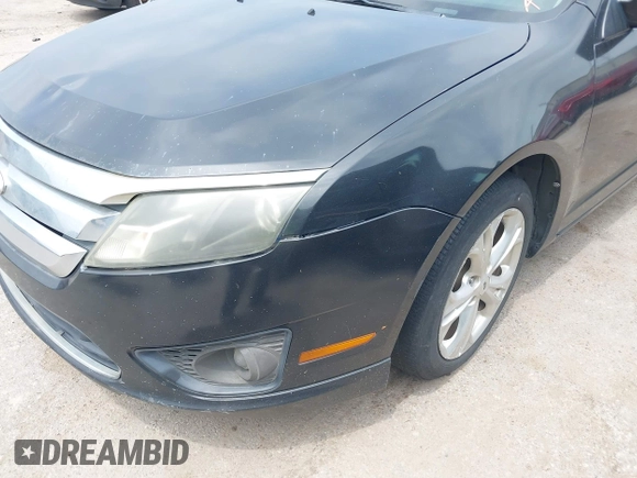 2012 Ford Fusion SE z VIN 3FAHP0HA4CR381213, wystawiony jako IAAI lot #42317783 z przebiegiem 193 816 mil mil oraz . Historia ofert i sprzedaży dostępna na DreamBid. Obrazek 6.