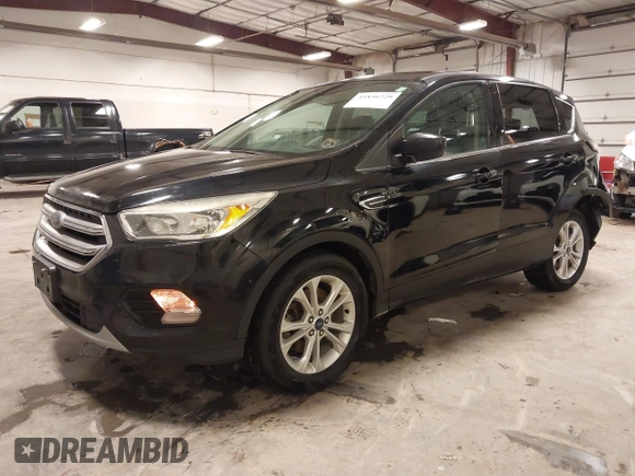 2017 Ford Escape SE with VIN 1FMCU9G94HUE08060, listed as a IAAI auction lot 41856229 with 187,838 mi miles and . Bid and sale history available at carsss.com. Image 22.
