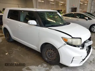 2012 Scion xB with VIN JTLZE4FE1C1145070, listed as a IAAI auction lot 41941158 with 168,968 mi miles. Bid and sale history available at carsss.com. Image 1.