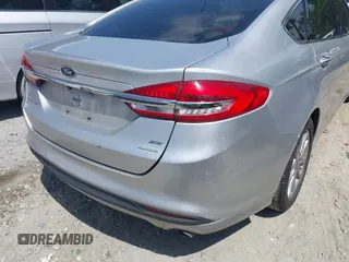 2017 Ford Fusion SE z VIN 3FA6P0HDXHR238713, wystawiony jako IAAI lot #42304140 z przebiegiem 157 630 mil mil oraz . Historia ofert i sprzedaży dostępna na DreamBid. Obrazek 6.